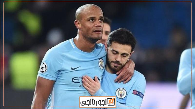 برناردو سيلفا ووكومباني بقميص مانشستر سيتي